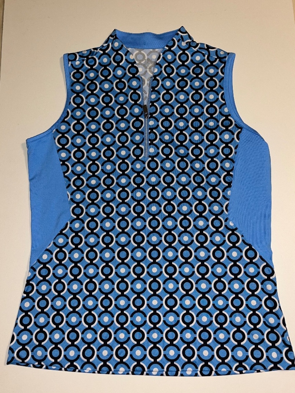 Tail Women's Micaela Sleeveless Golf Top in the Dotted Blooms pattern size M